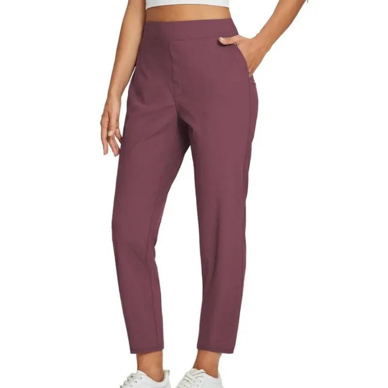 Pantalon femme taille haute extensible avec poches zippées