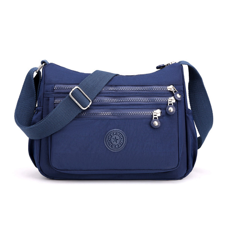 💐 -50% DE RÉDUCTION – OFFRE FLASH ! Sac à bandoulière en nylon léger avec plusieurs poches – parfait pour les voyages et l'usage quotidien 🎒⚡