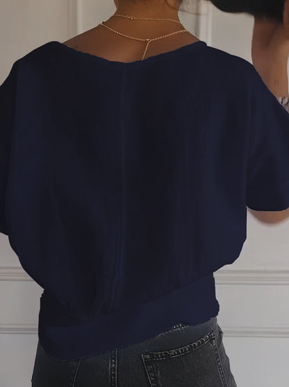 T-shirt simple à manches mi-longues et col en V de couleur unie