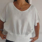 T-shirt simple à manches mi-longues et col en V de couleur unie