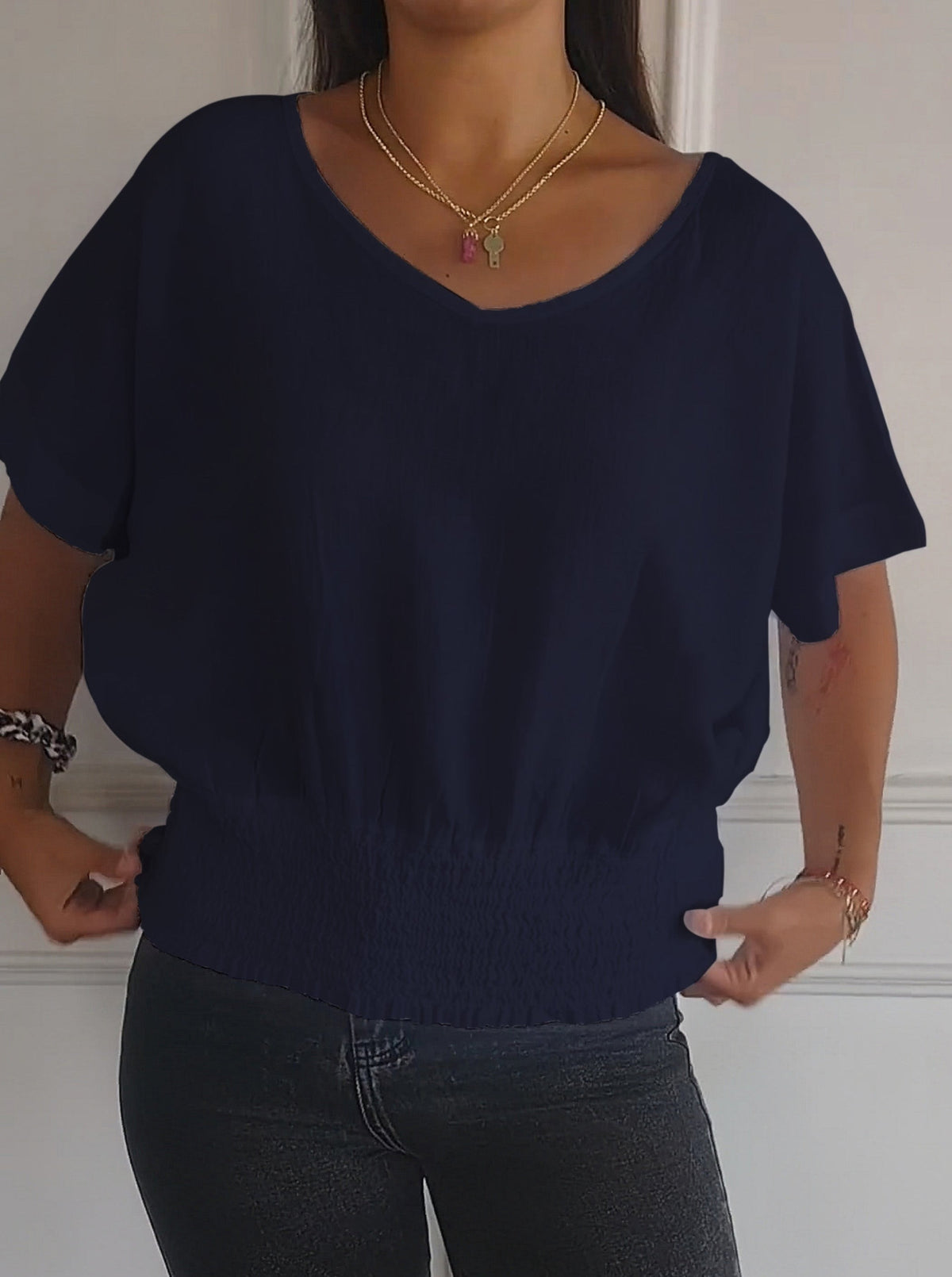 T-shirt simple à manches mi-longues et col en V de couleur unie