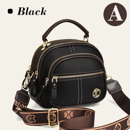 Sac classique multi-compartiments à bandoulière large et ajustable en cuir
