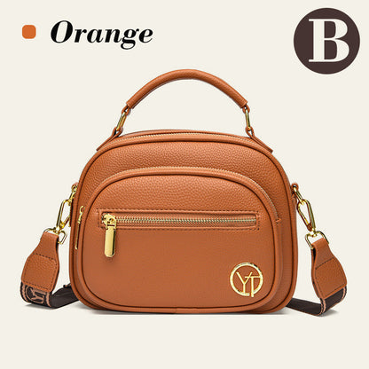 Sac classique multi-compartiments à bandoulière large et ajustable en cuir