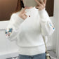 Pull en tricot épais brodé de fleurs