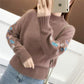 Pull en tricot épais brodé de fleurs