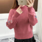 Pull en tricot épais brodé de fleurs