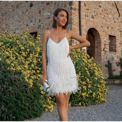 👗 60 % DE RÉDUCTION MAINTENANT ! ✨ Robe à bretelles spaghetti et franges – Paillettes glamour, jupe fluide à volants, parfaite pour une soirée festive 🌟🎉
