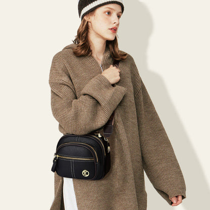 Sac classique multi-compartiments à bandoulière large et ajustable en cuir