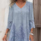 Robe élégante en dentelle à manches mi-longues et col en V pour femmes