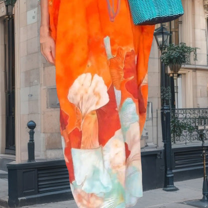 Robe longue ample à imprimé floral et demi-manches