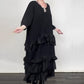 Robe fluide oversize à volants et superpositions