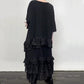 Robe fluide oversize à volants et superpositions