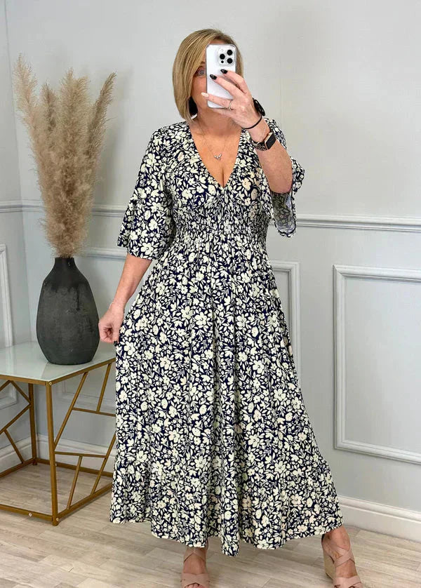 Robe léopard avec taille froncée