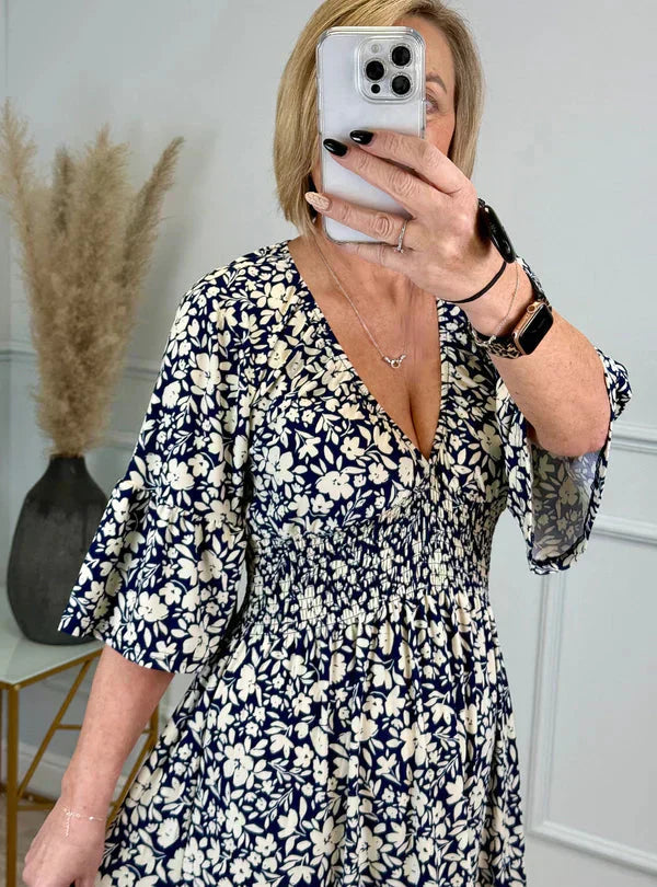 Robe léopard avec taille froncée