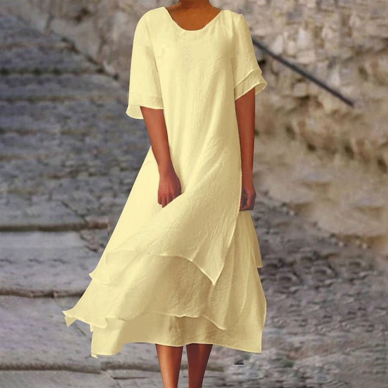 Robe midi femme à col rond et ourlet irrégulier