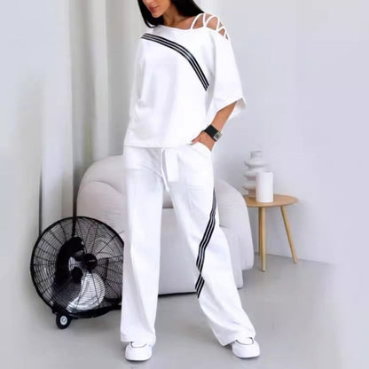 🎁 Vente chaude 49% de réduction 🔥 Ensemble deux pièces haut à manches courtes et pantalon rayé pour femme