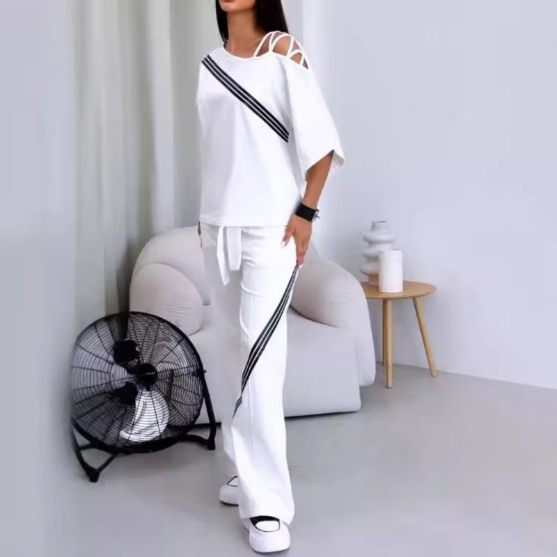 🎁 Vente chaude 49% de réduction 🔥 Ensemble deux pièces haut à manches courtes et pantalon rayé pour femme