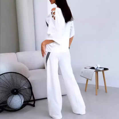 🎁 Vente chaude 49% de réduction 🔥 Ensemble deux pièces haut à manches courtes et pantalon rayé pour femme