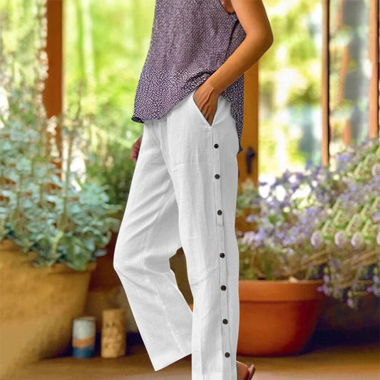 Pantalon 7/8 décontracté de couleur unie avec boutons latéraux et coupe ample