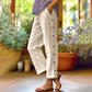 Pantalon 7/8 décontracté de couleur unie avec boutons latéraux et coupe ample