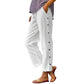 Pantalon 7/8 décontracté de couleur unie avec boutons latéraux et coupe ample