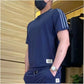 Ensemble 2 pièces pour hommes comprenant un haut à manches courtes et un bas de jogging extensible
