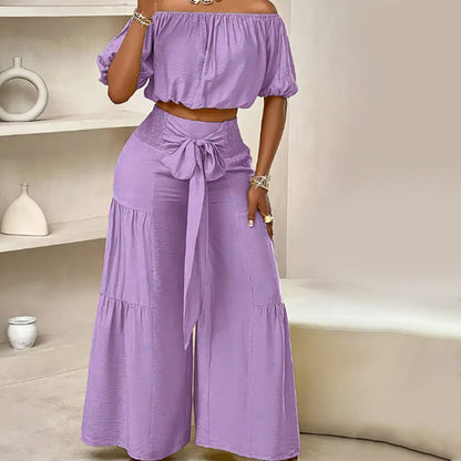 👚 49 % DE RÉDUCTION EN CE MOMENT ! 🌸 Ensemble 2 pièces composé d'un haut à manches bouffantes et épaules dénudées et d'un pantalon à jambes larges – Élégant, confortable et idéal pour les journées d'été ☀️