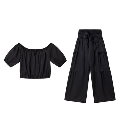 👚 49 % DE RÉDUCTION EN CE MOMENT ! 🌸 Ensemble 2 pièces composé d'un haut à manches bouffantes et épaules dénudées et d'un pantalon à jambes larges – Élégant, confortable et idéal pour les journées d'été ☀️