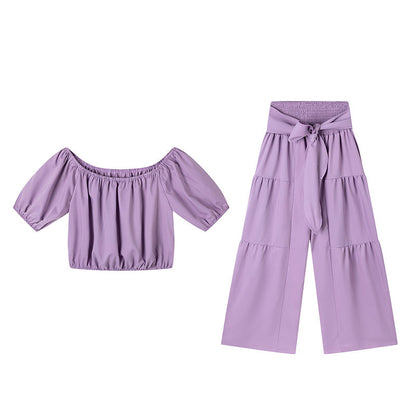 👚 49 % DE RÉDUCTION EN CE MOMENT ! 🌸 Ensemble 2 pièces composé d'un haut à manches bouffantes et épaules dénudées et d'un pantalon à jambes larges – Élégant, confortable et idéal pour les journées d'été ☀️