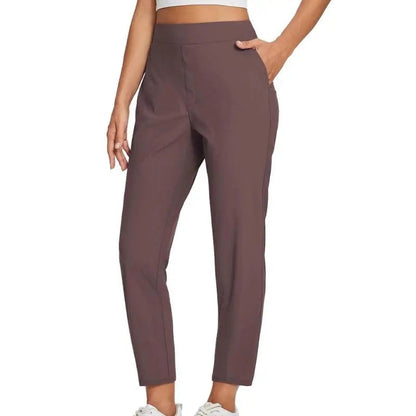 Pantalon femme taille haute extensible avec poches zippées