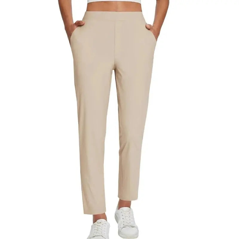 Pantalon femme taille haute extensible avec poches zippées