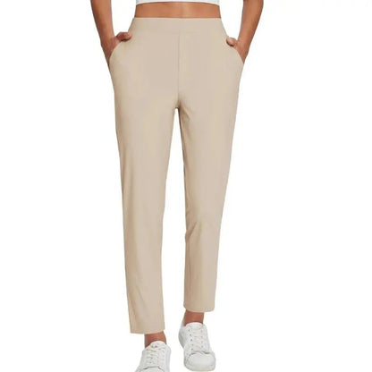 Pantalon femme taille haute extensible avec poches zippées