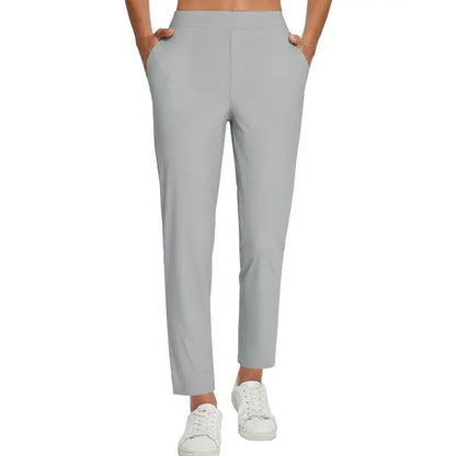 Pantalon femme taille haute extensible avec poches zippées
