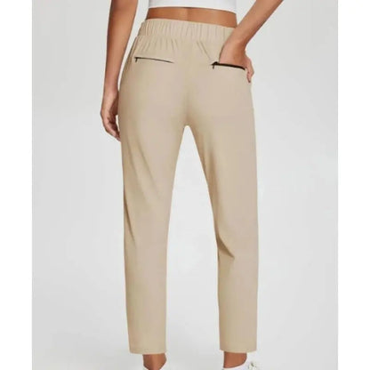 Pantalon femme taille haute extensible avec poches zippées