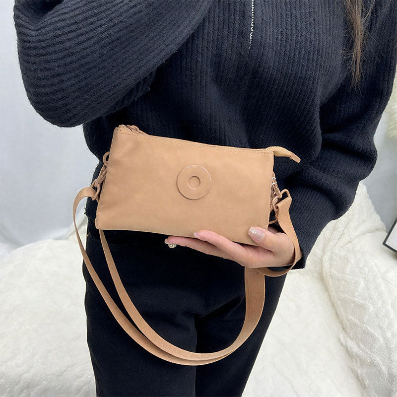 Sac à bandoulière à fermeture éclair