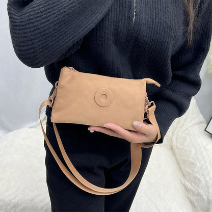 Sac à bandoulière à fermeture éclair