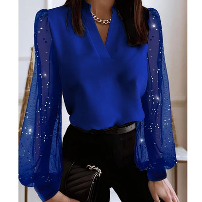 Haut à col V avec manches transparentes à sequins