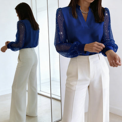 Haut à col V avec manches transparentes à sequins