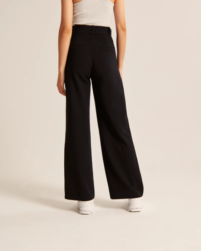 Pantalon taille haute à jambes larges et coupe ajustée