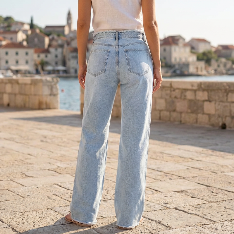 Jean taille haute à jambes larges avec ourlet effiloché
