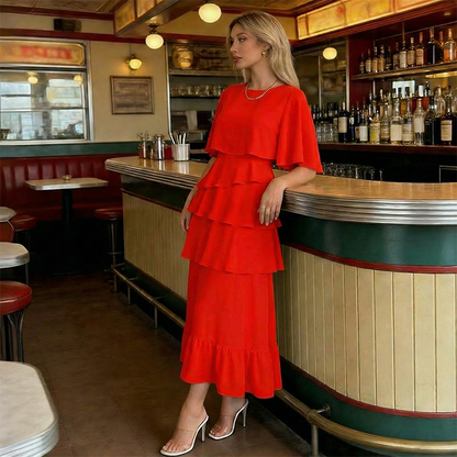 Robe élégante à manches à volants superposés