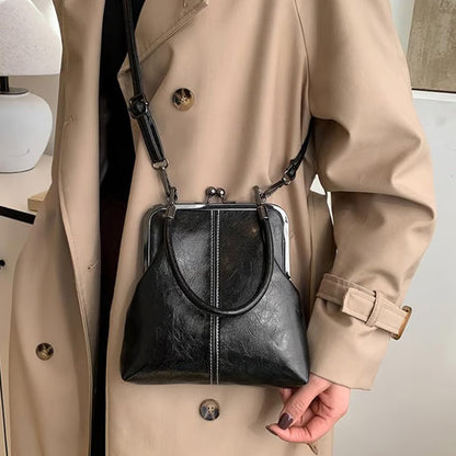 Sac bandoulière pour femme avec fermoir à boule et poignée supérieure