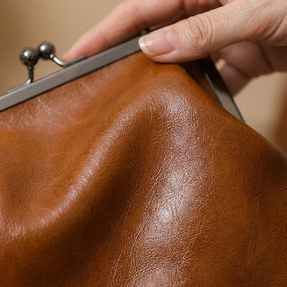 Sac bandoulière pour femme avec fermoir à boule et poignée supérieure