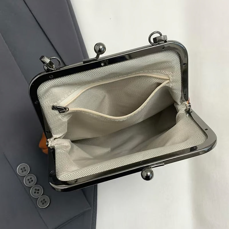 Sac bandoulière pour femme avec fermoir à boule et poignée supérieure