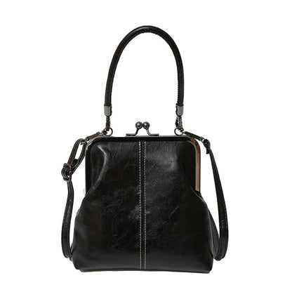 Sac bandoulière pour femme avec fermoir à boule et poignée supérieure