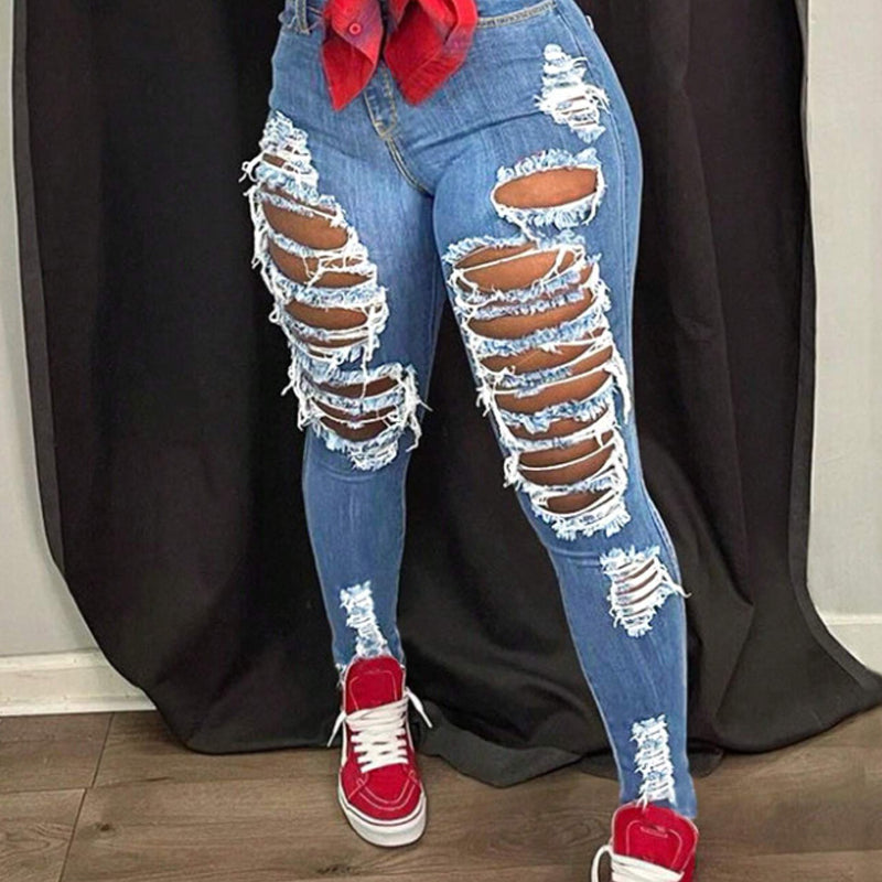 Jean skinny taille haute femme effet usé déchiré