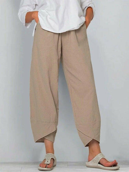Pantalon vintage à taille élastique et poches asymétriques