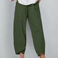 Pantalon vintage à taille élastique et poches asymétriques