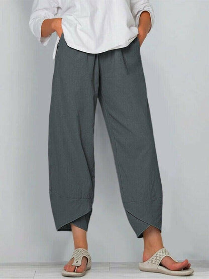 Pantalon vintage à taille élastique et poches asymétriques
