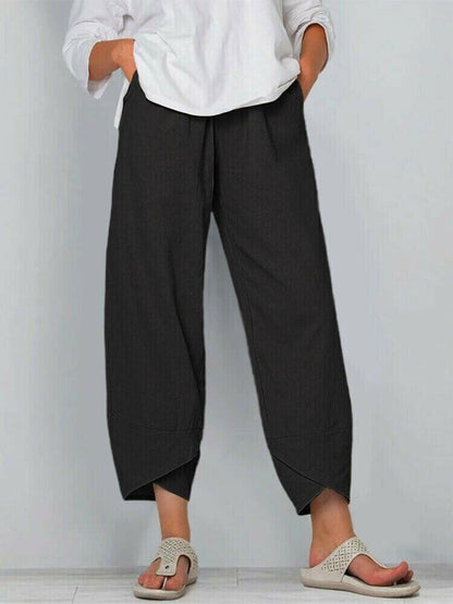 Pantalon vintage à taille élastique et poches asymétriques